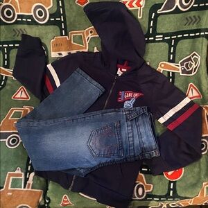 Tommy Bahama Navy Jacket and True Religion Denim Jeans.